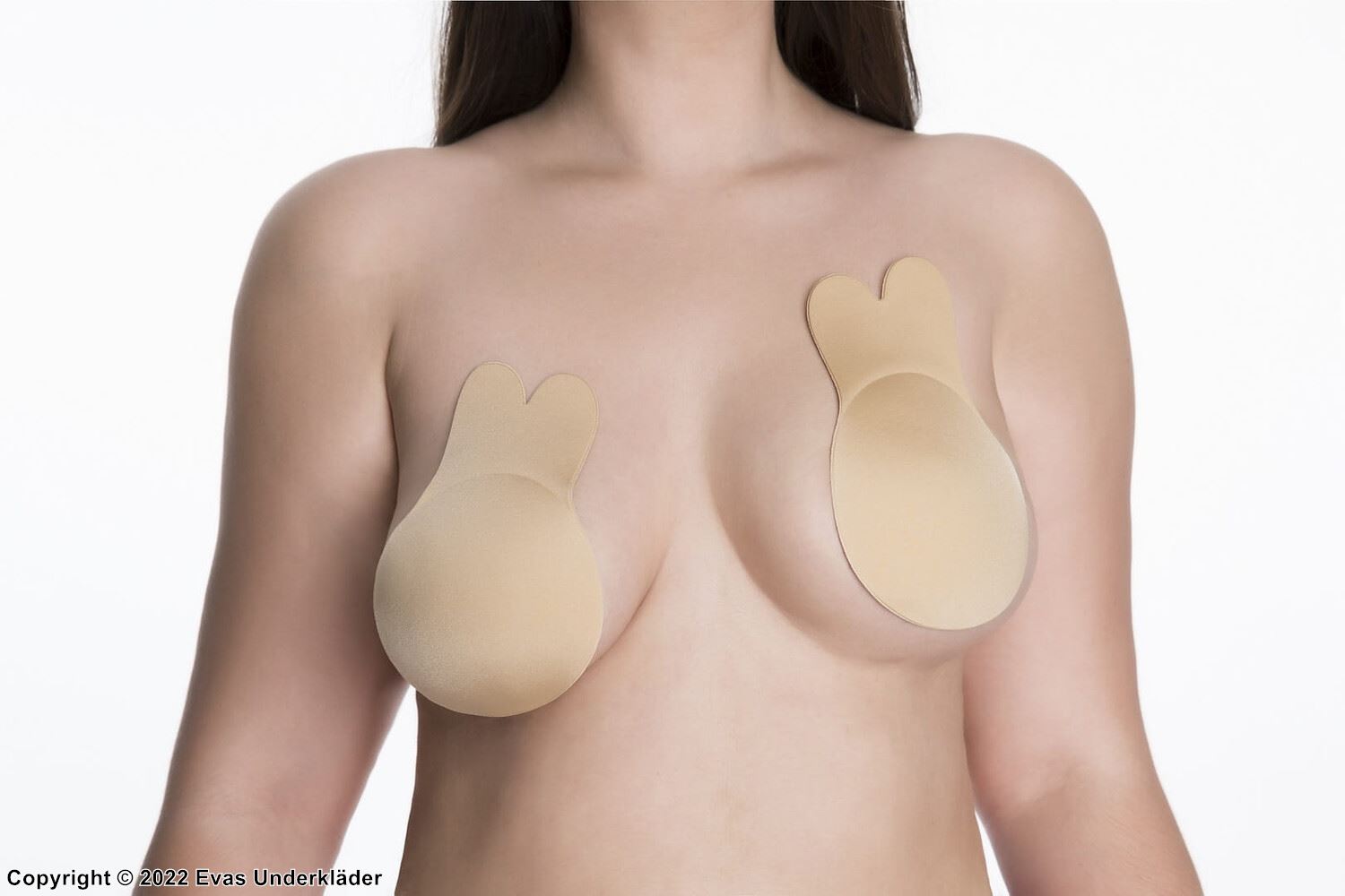 Self-adhesive bra patch, lifts the bust